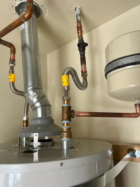 Water heater installation and plumbing repair in West Acton